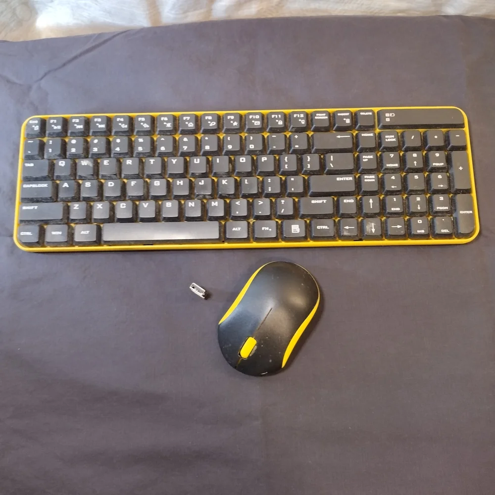 Logitech Black and Yellow Wireless Keyboard and Mouse Combo